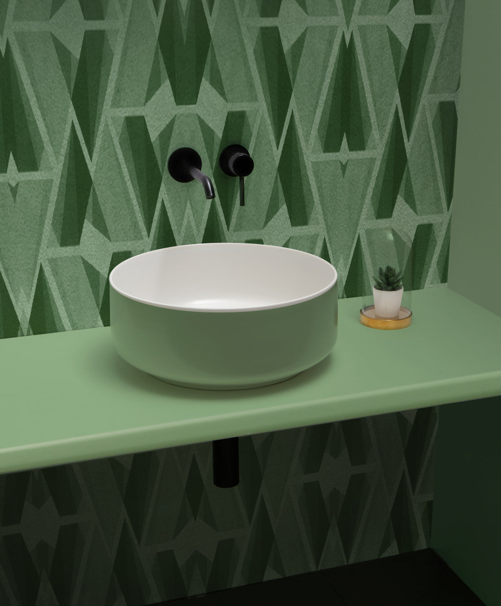 scenografia lavabo tondo Bucchero Bis bianco e verde Salvia